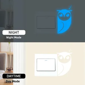 Glow-in-the-dark owl light switch sticker showing daytime white and night blue fluorescent effect