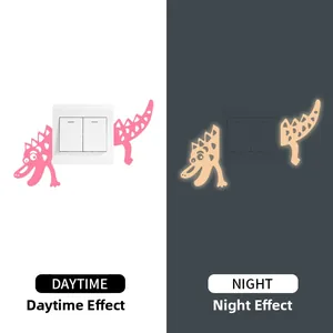 Glow-in-the-dark dinosaur light switch sticker showing daytime pink and night glowing effects