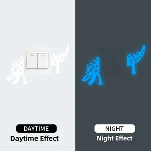 Luminous cartoon crocodile switch sticker showing day and night glowing blue effect