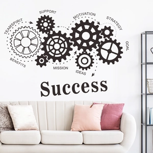 Detail of industrial gear wall sticker with TEAMSPIRIT and STRATEGY text for office decor