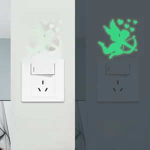 Luminous cupid wall stickers showing daylight and neon green glow-in-the-dark effects