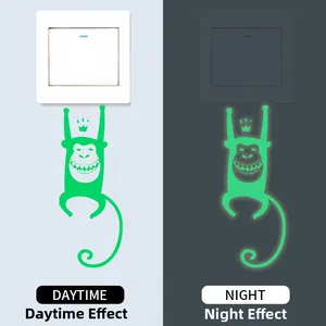 Luminous monkey wall sticker showing glow-in-the-dark effect in daytime and night