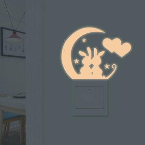 Luminous moon and kissing bunnies wall sticker for light switch decor in warm yellow