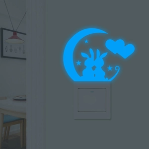 Luminous wall sticker featuring rabbits and moon for light switch home decoration