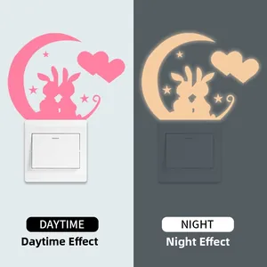 Luminous wall sticker showing daytime design and night glowing effect on light switch