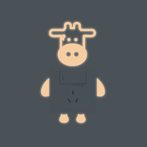 Luminous cartoon cow wall switch sticker and socket decor with warm orange glow effect