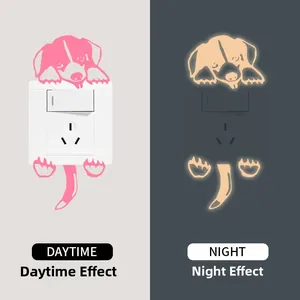 Adesivo per interruttore cane luminoso con effetto fosforescente giorno e notte