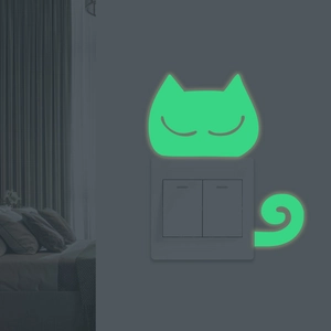 Luminous green cat wall sticker for light switch decor in dark bedroom setting