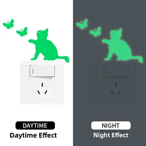 Luminous cat and butterfly wall stickers showing daytime and night glowing effects