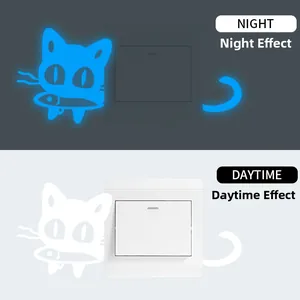 Luminous cat and fish light switch sticker showing day and night glowing blue effect