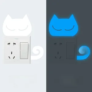 Glow in the dark cat wall sticker showing daytime white and night luminous blue effects