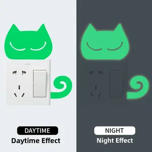 Glow in the dark cat wall stickers showing day and night luminous effect on switch