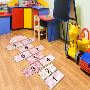 Pink floral hopscotch floor decals for kids bedroom featuring numbered squares 1-10