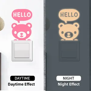 Luminous bear light switch sticker showing day and night fluorescent visual effect