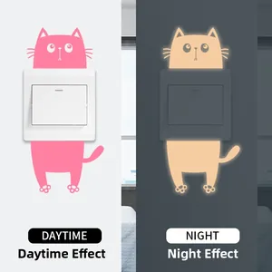 Glow in the dark cat light switch sticker showing daytime and nighttime luminous effects