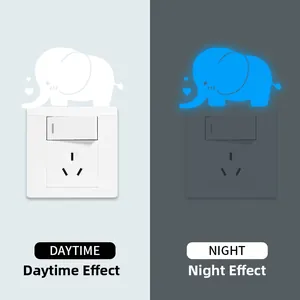 Luminous elephant wall sticker showing blue glow effect for light switch decoration