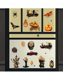 Details der Halloween-Fensterbilder mit Kürbissen, Fledermäusen und Schloss am Glas