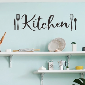 Détail d'un sticker mural Kitchen noir avec icônes d'ustensiles sur mur bleu