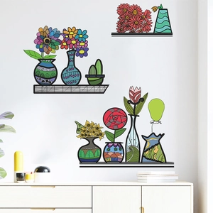 Creative hand-drawn floral vase wall stickers displayed on a white wall above a wooden cabinet