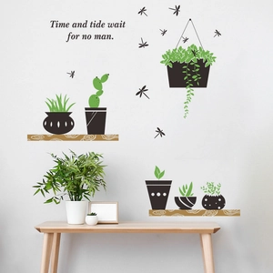 Detail of green potted plant wall decals with wooden shelf design and English motto