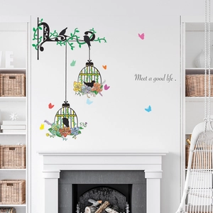 Minimalist iron birdcage wall sticker with colorful flowers and butterflies for home decor