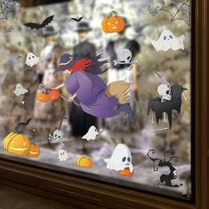 Halloween window decals featuring witch on broomstick, pumpkins, bats and ghosts