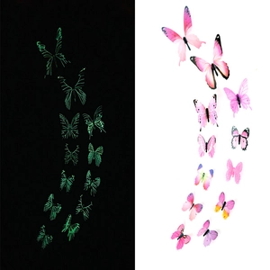 Stickers muraux papillons 3D lumineux montrant l'effet de lueur de jour et de nuit