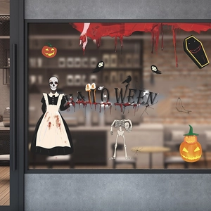 Halloween window decals featuring skeletons and pumpkins on a glass storefront shop window