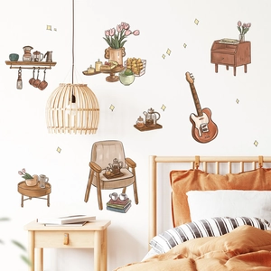 Dettaglio di adesivi murali vintage con chitarra e decorazioni per la casa nordica