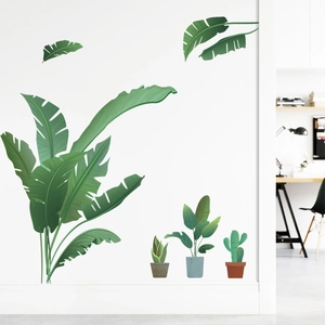 Tropical green leaf wall stickers with potted plant decals on a white modern living room wall