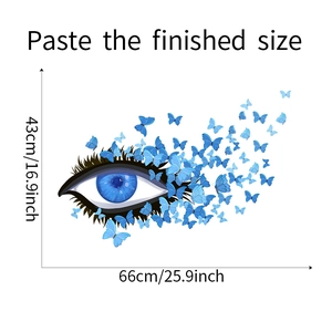 Blue eye and butterfly wall sticker dimensions shown as 43cm by 66cm on white background