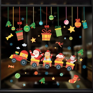 Christmas window decals with Santa Claus on a colorful train and festive animal decorations