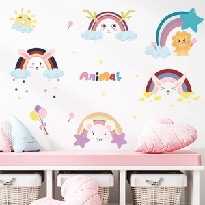 Nursery wall stickers featuring rainbow animals, sun, and stars in pastel colors