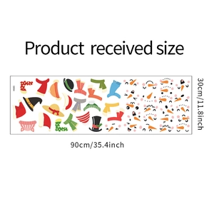 Detailed sheet layout of Christmas wall stickers featuring snowmen faces and scarves