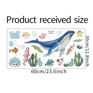 Detail view of cartoon blue whale wall sticker sheet with ocean plants measuring 60x30cm