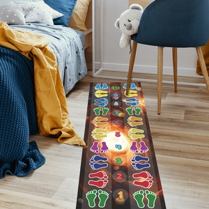 Close-up of galaxy hopscotch floor decal with stars and numbered footprints for kids room