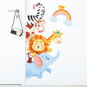 Detail of self-adhesive cartoon animal wall stickers featuring rainbow and giraffe in nursery
