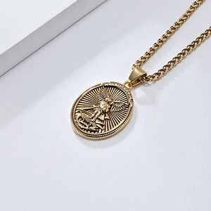 Detailed relief of Saint Michael on golden oval pendant with textured wheat chain