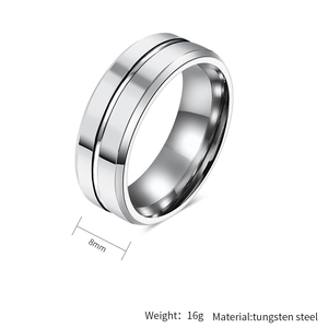Detail of 8mm silver tungsten steel ring with a polished surface and center groove