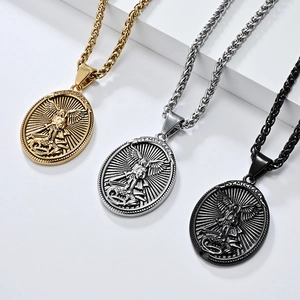 Detailed relief of St. Michael shield pendant in gold, silver, and black finish