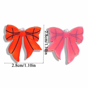 Detail view of acrylic bow pendants with basketball texture and dimensions of 2.8cm