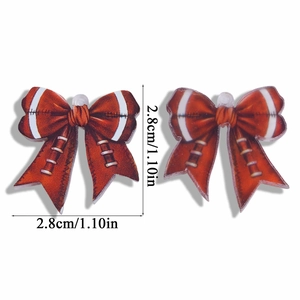 Macro view of acrylic bow pendants with American football print and 2.8cm size markings