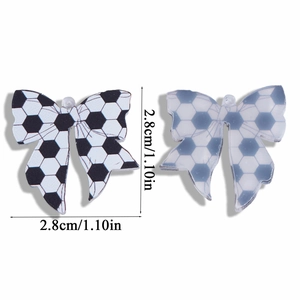 Macro detail of acrylic football bow pendants with dimensions of 2.8cm for DIY jewelry
