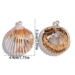 Detailed view of ocean-style shell pendants with laser gold plating and size measurements
