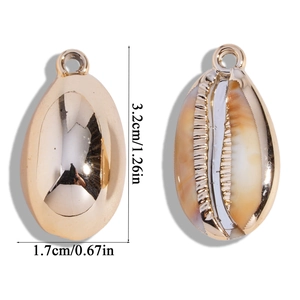 Detailed view showing both sides of a gold shell pendant with dimensions 3.2cm by 1.7cm