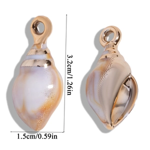 Detailed view of laser gold acrylic seashell charm with dimensions 3.2cm by 1.5cm