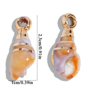 Detailed view of sea shell pendant with gold stripes and dimensions 2.3cm by 1cm