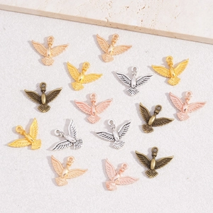 Bird shaped alloy charms for DIY jewelry making in gold, silver, and bronze finishes