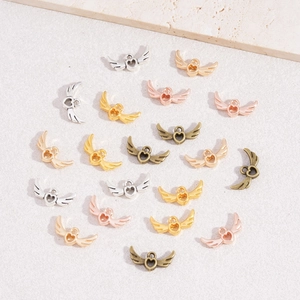 Hollow heart wing alloy pendants in gold silver and bronze for DIY jewelry making