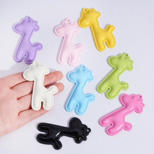 Colorful PU giraffe pendants for DIY keychains and bag charms in eight vibrant colors